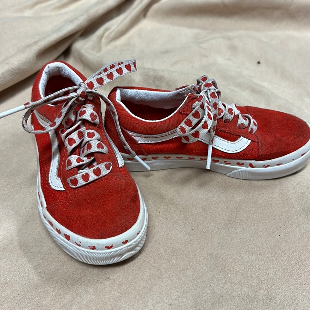 Red suede Vans with hearts